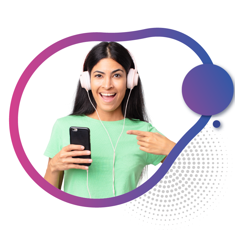 Excited woman with headphones sharing smartphone experience.